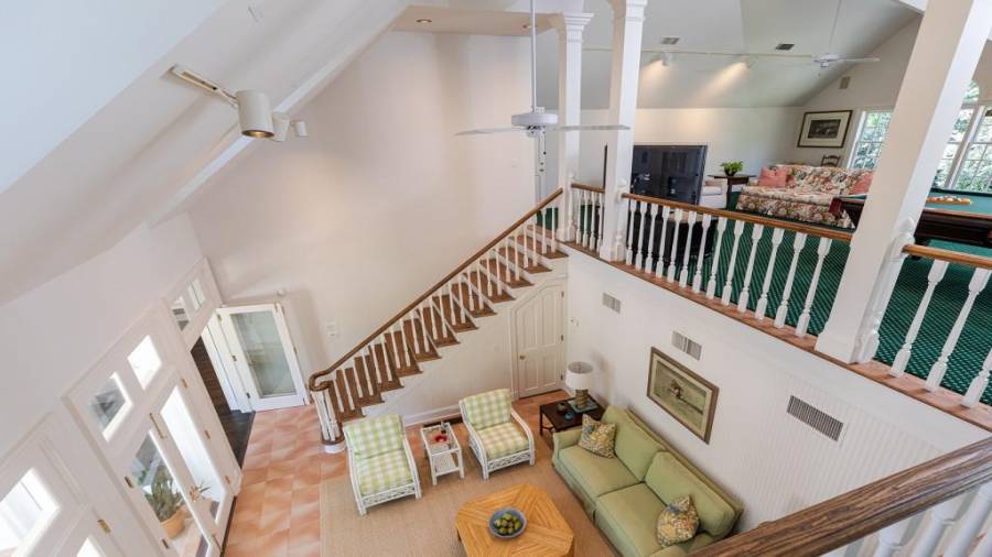 Two-story pool house and recreation room.