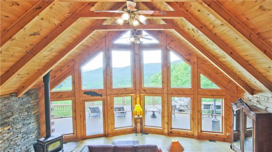 The beauty of the North Georgia mountains is showcased by the wall of windows.