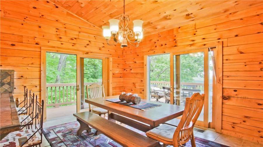 The Dining Room has two sliding glass doors which allows you to bring nature inside while you dine.