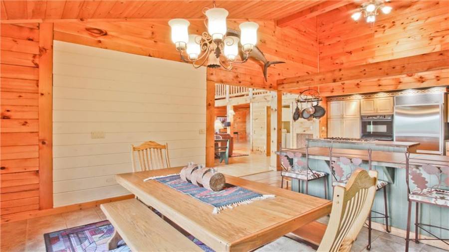 The Dining Room has two sliding glass doors which allows you to bring nature inside while you dine.