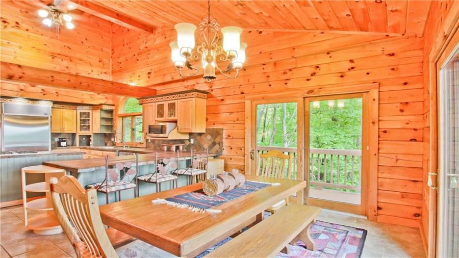 The Dining Room has two sliding glass doors which allows you to bring nature inside while you dine.