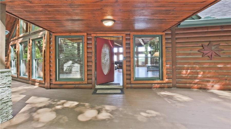 Welcome your guests at the covered front entry.