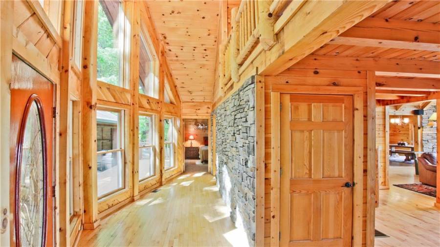 The first guest bedroom in this home is to the left of the front door as you enter.  This offers your guest a lot of privacy. There is a full bath down this hallway as well.