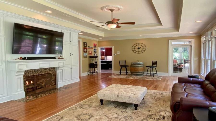 The 2 Sided Gas Log Fireplace in the Sun Room can be used to keep you toasty in the Winter Time