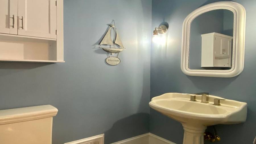 The Half Guest Bath on the Main Level