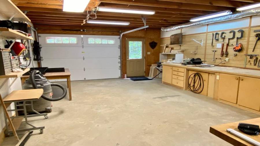 Here is the Basement workshop and the 3rd car garage parking