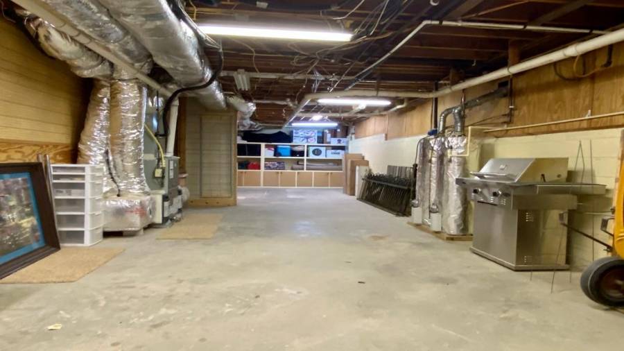 The other end of 4th car garage parking .... the 95% effeciienty gas furnace offers ultravioulet filter and a humidifier