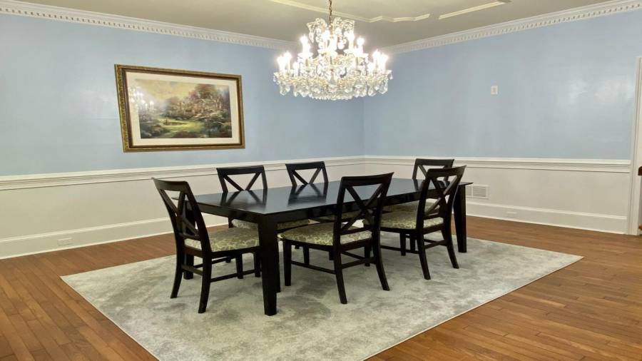 To the Left, the Formal Dining Awaits, plenty of room for the largest of Families