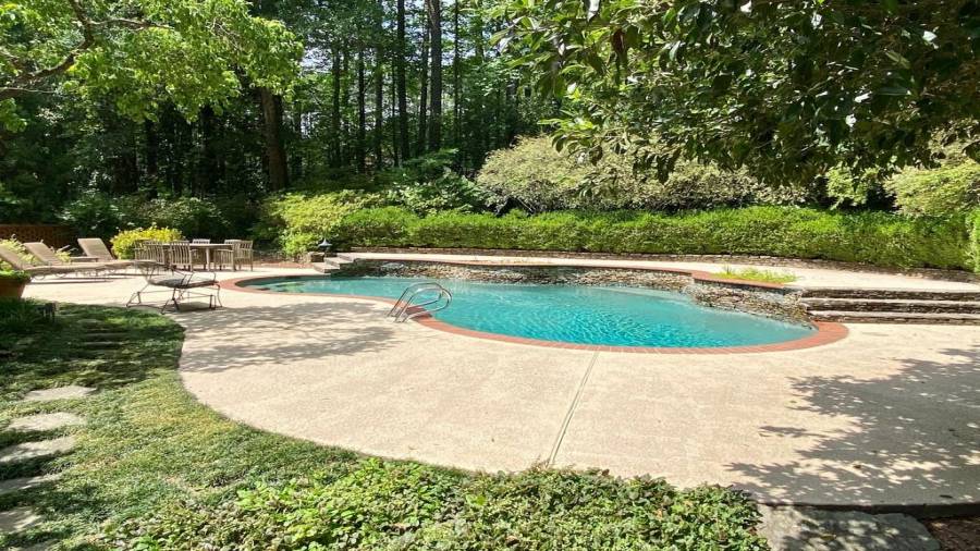 And the pathway leads back to the pool.... oh yes, the property backs up to dedicated green space too