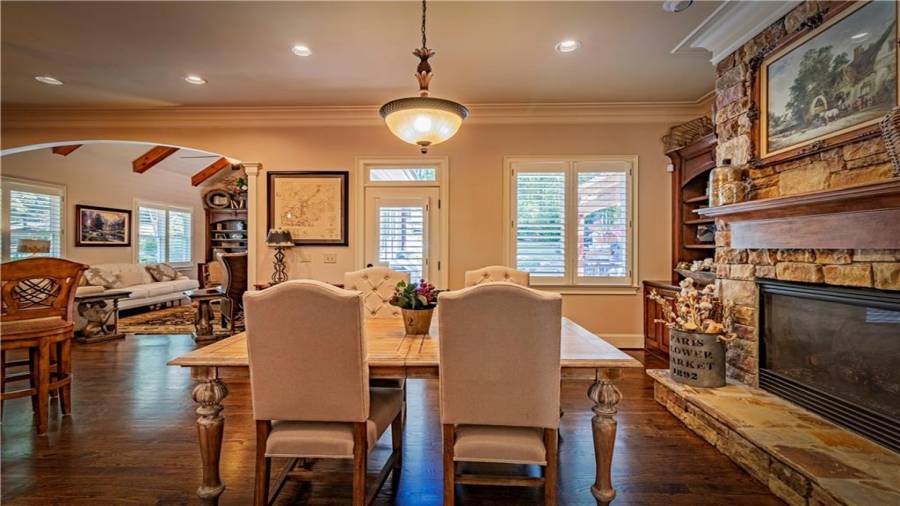 Breakfast Nook and stacked stone fireplace.