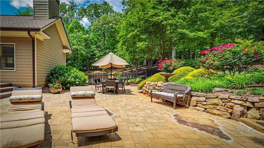 Enjoy the beautiful landscaping and privacy.