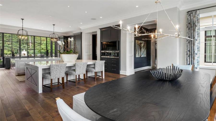 Spectacular kitchen with double quartz islands and a breakfast room.
