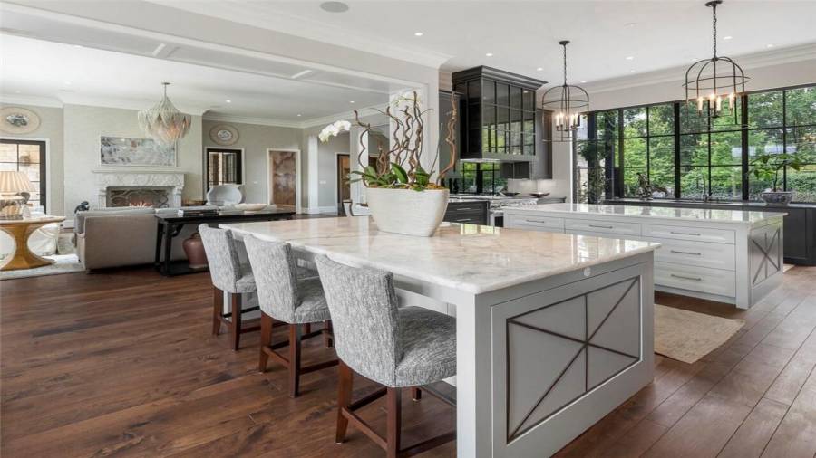 The kitchen and family room overlook the property and the pool.