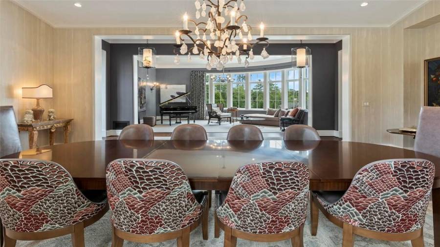 Dining room looks out into the living room, an ideal floor plan for entertaining.