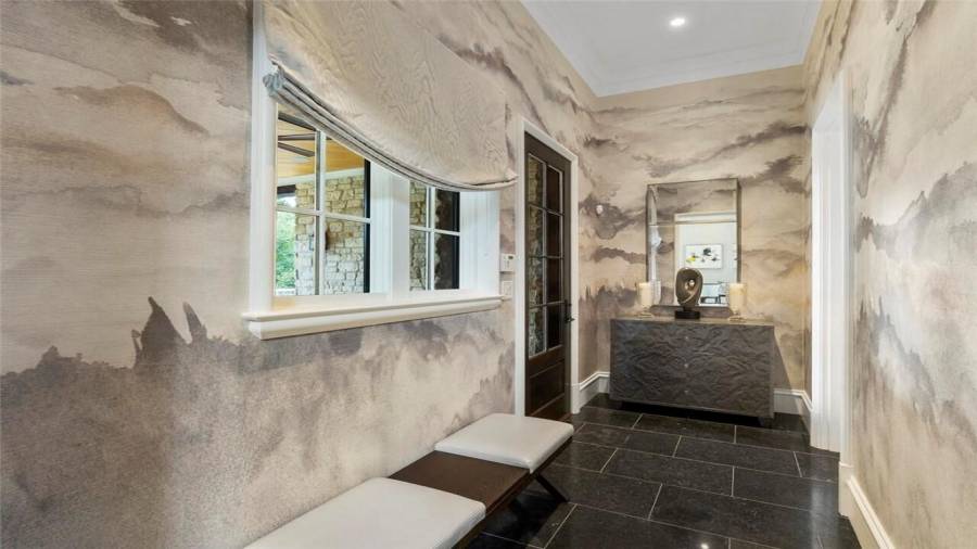 Hallway to patio and half bath.