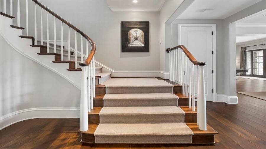 Secondary stair up to the kitchen.