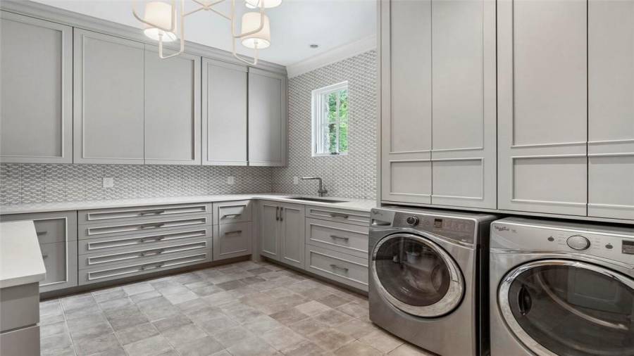 Main laundry upstairs near guest apartment.