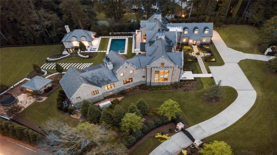 Incredible 2+- Acre estate designed by Harrison Design. Main gate on West Garmon. Completed in early 2020.