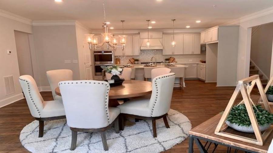 Representation Photo of a Decorated Promenade III plan.  Plenty of space for all of your favorite pieces! Spacious Open Living Area, Great for family gatherings. Some finishes and features will vary.