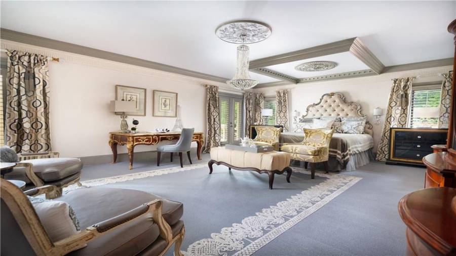 Master bedroom with custom carpet with no seams.