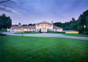 4.5 Acre gated property with 18,500sqft.  6 Car garage, with professional lighting and security systems.
