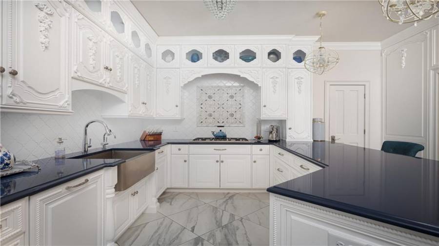 Marble floors and Coutertops in Basement Kitchen.