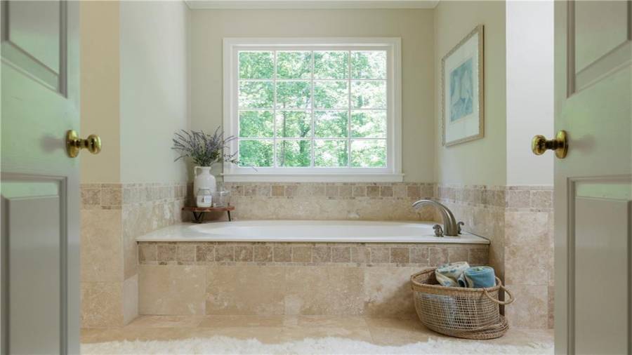 Renovated primary bath feels just like your own spa!