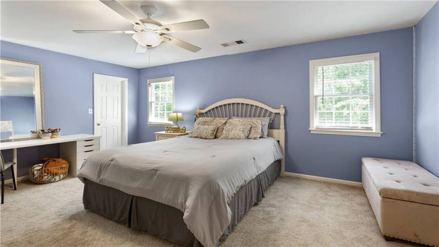 Upstairs secondary bedroom with private ensuite bathroom.