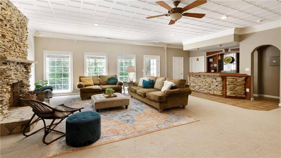 Your guests will love the stacked stone fireplace and custom bar with a walk-out to the lower deck.