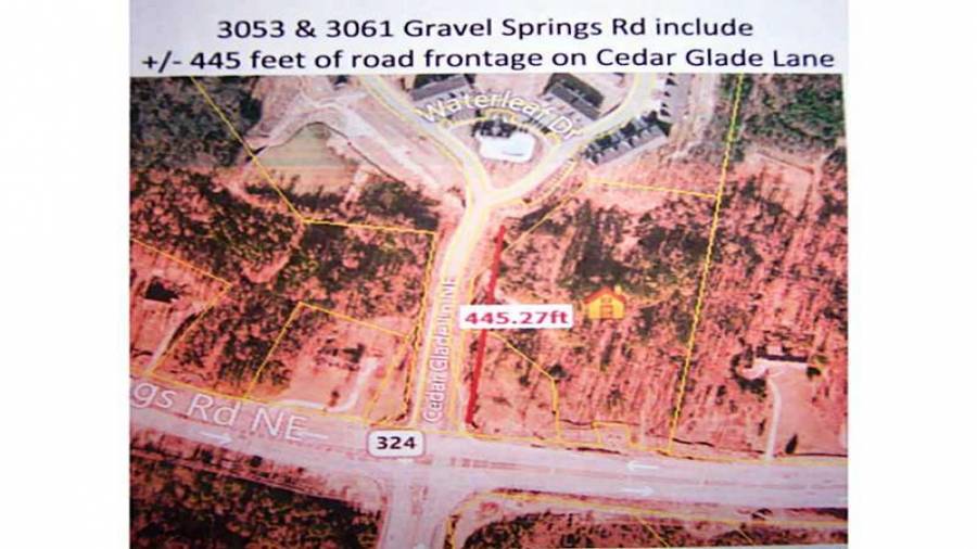 Aerial View 3053 & 3069 Gravel Springs Rd site includes all utilities plus curb cuts on Cedar Glade Lane & Gravel Springs Rd / SR 324 - Intersection of SR 324 / Gravel Spring Rd, Mall of Ga Blvd, & Cedar Glade Ln