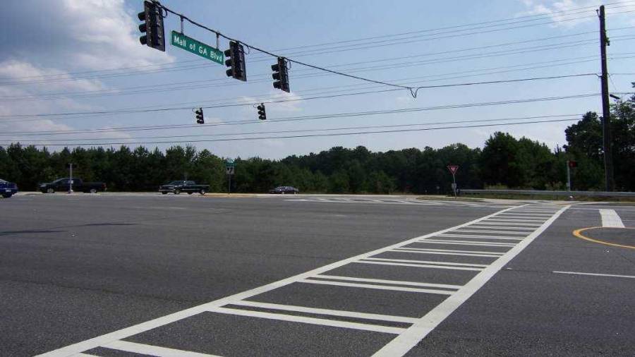 3053 & 3069 Gravel Springs Rd site includes all utilities plus curb cuts on Cedar Glade Lane & Gravel Springs Rd / SR 324 - Intersection of SR 324 / Gravel Spring Rd, Mall of Ga Blvd, & Cedar Glade Ln