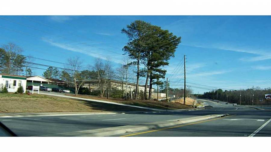 two land parcels west is the operating assisted living see www.IvySpringsManor.com located at 3177 Gravel Springs Rd, Buford
