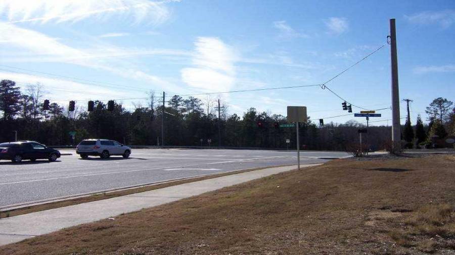 3053 Gravel Springs Rd site includes all utilities plus curb cuts on Cedar Glade Lane and Gravel Springs Rd / SR 324 - Intersection of SR 324 / Gravel Spring Rd, Mall of Ga Blvd, & Cedar Glade Ln