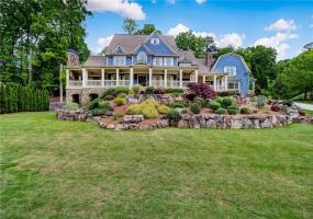 Professionally landscaped and lighted yard.