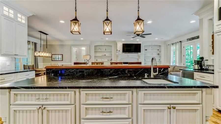 Gorgeous soap stone island and seating.