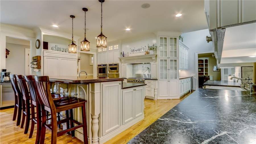 Plenty of counter space and beautiful cabinetry.