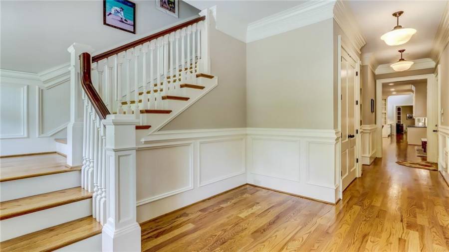 Rear stairs to apartment and living area.