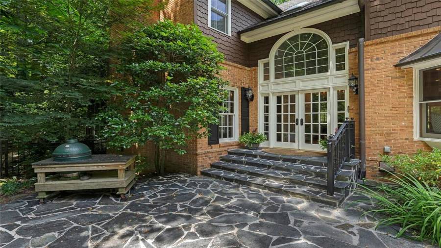 Beautiful custom french doors lead to sitting room