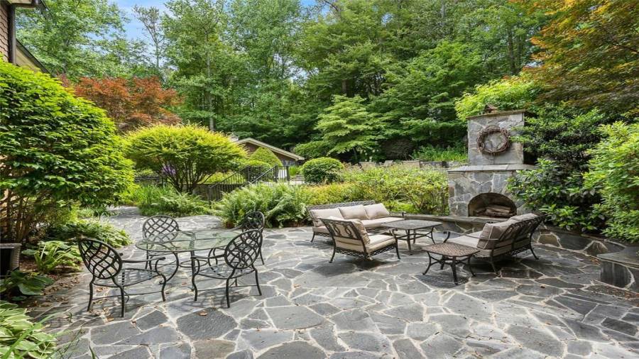 Dine al fresco by the grand fireplace