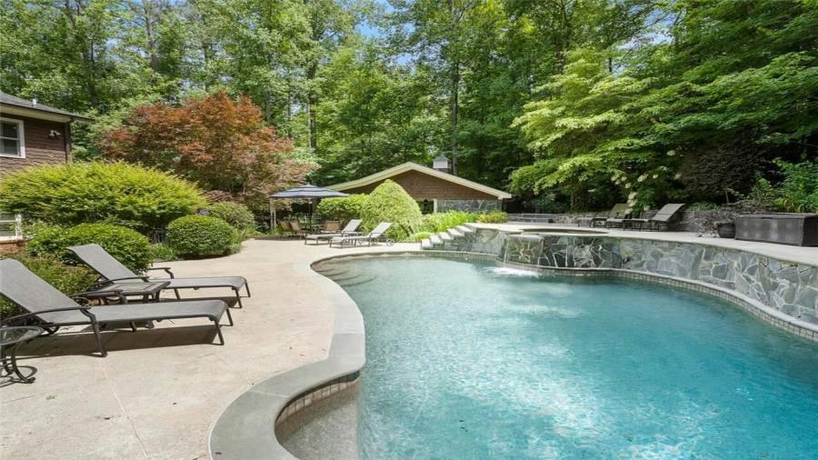 Heated salt water gunite pool & waterfall spa