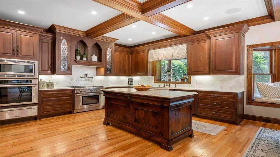 Gold Calacatta marble contertops& custom cabinetry