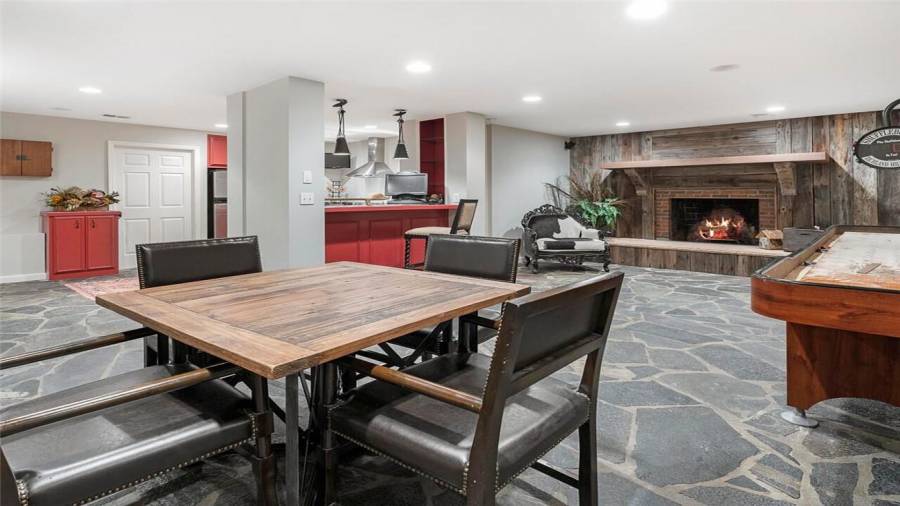 Cozy f/p w/custom mantel & blue stone flooring