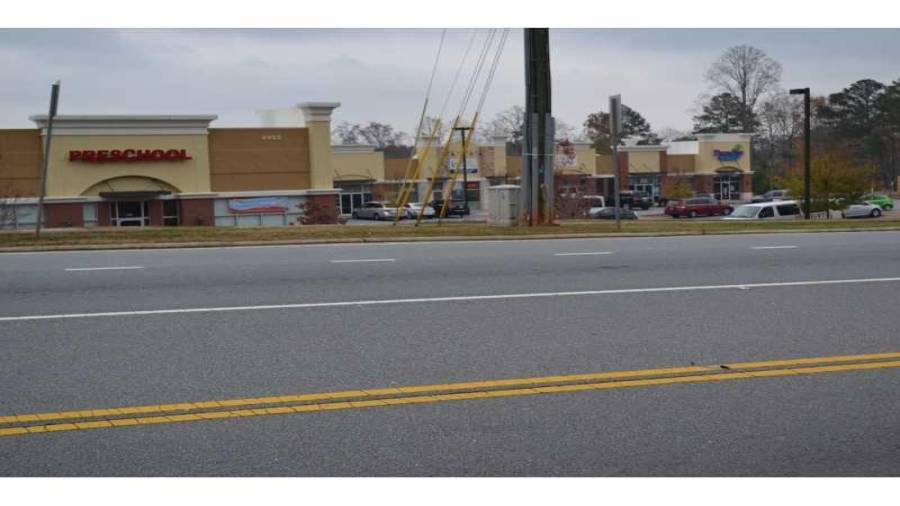 Exterior Front. Looking across the street from the home.