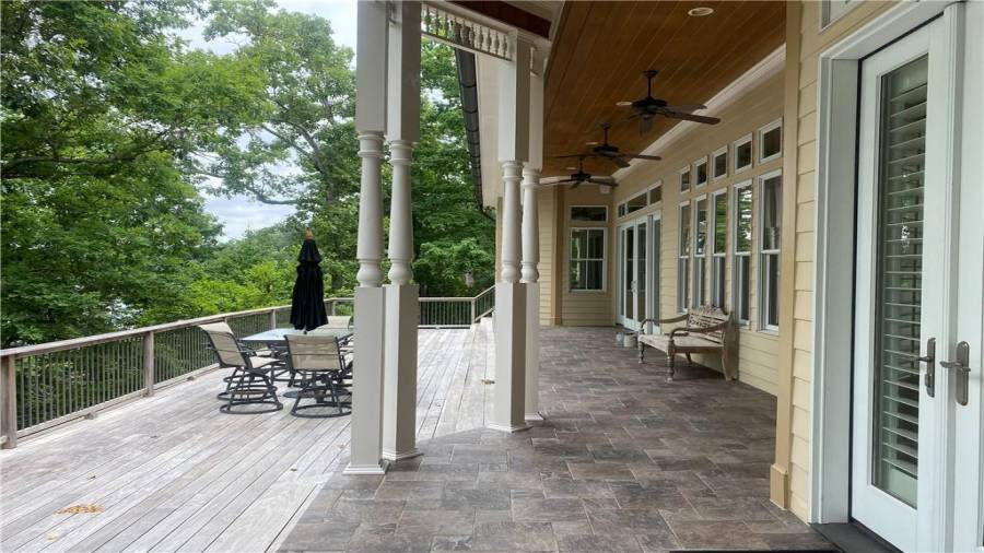 Spacious deck on the main level is extremely large. The views from this covered porch and deck is amazing.