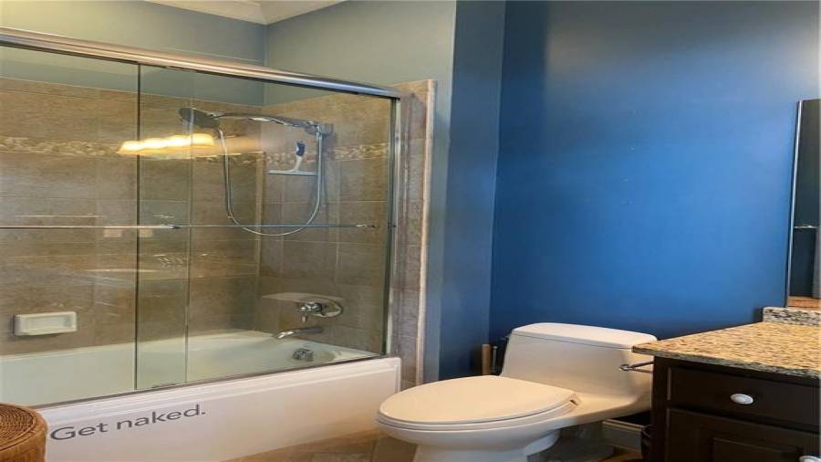 This is the full bath for the blue bedroom upstairs. Tiled floors, granite counter tops.