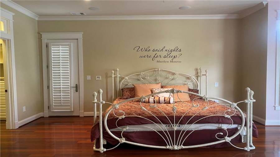 Another spacious bedroom with fireplace, deck, and viewing area overlooking the lake. Room was built for someone special. Adjoining Jack & Jill bathroom.