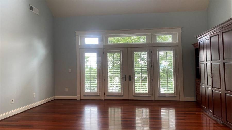 Third room up stairs overlooking the lake can double as a extra bedroom this is a Murphy bed on the left. Could be a reading room, sewing room, or a play room. What would you use it for?