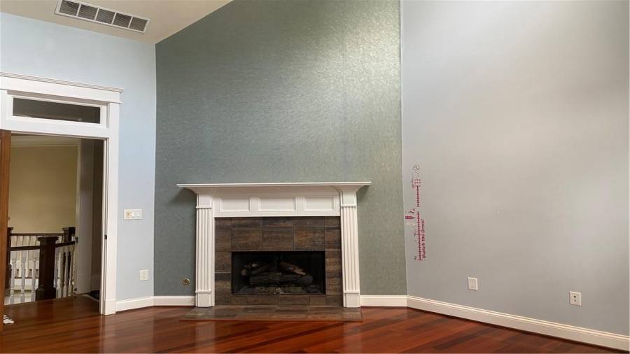 3rd room upstairs also has a fireplace. The hardwood floors look new they are so shiny and bright.