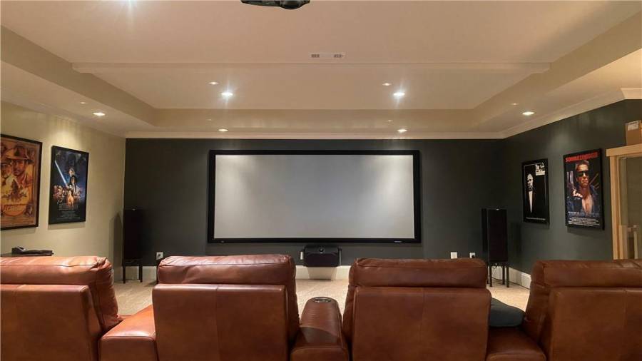 Who wants to watch a movie in this theatre room? Its located on the terrace level.