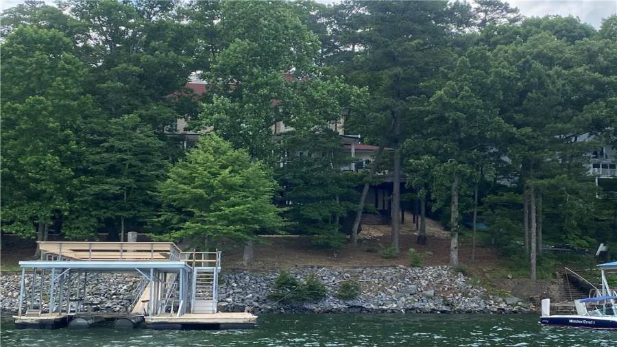 Custom home right on the waterfront! If you are looking for privacy this is it. The tree limbs offer shade and privacy. The breeze coming off the water is wonderful. Serenity surrounds this home.
